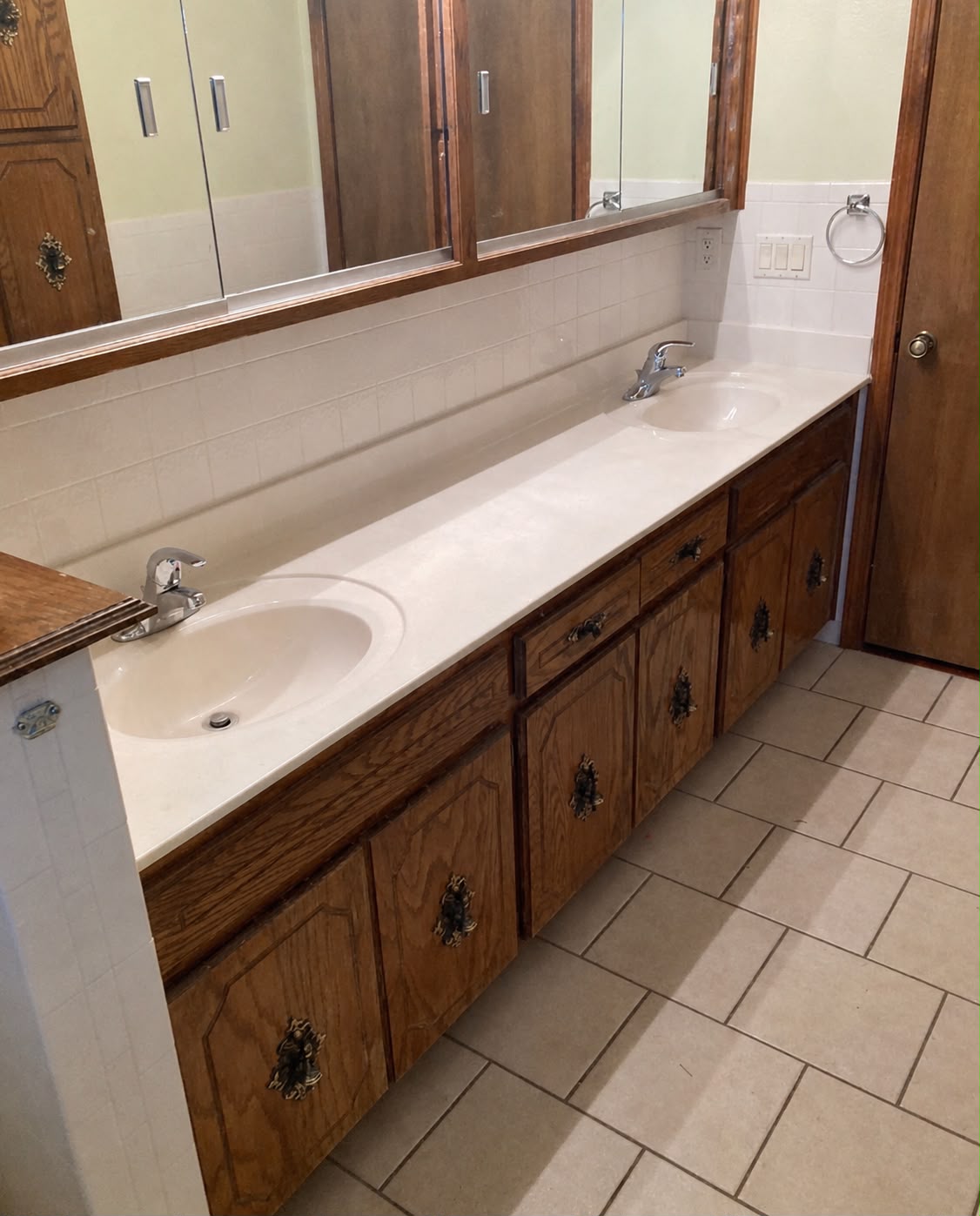Double vanity bathroom before All Star Remodeling & Construction upgrade